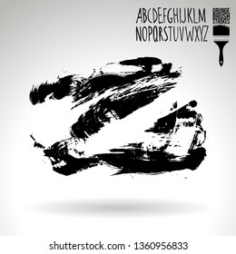 Black brush stroke and handwritten alphabet. Grunge vector abstract hand - painted element. Underline and border design.
