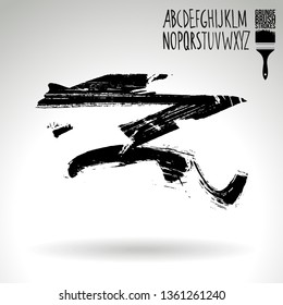 Black brush stroke and handwritten alphabet. Grunge vector abstract hand - painted element. Underline and border design.