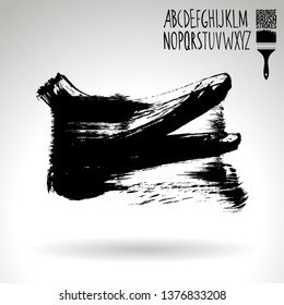 Black brush stroke and handwritten alphabet. Grunge vector abstract hand - painted element. Underline and border design.
