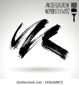 Black brush stroke and handwritten alphabet. Grunge vector abstract hand - painted element. Underline and border design.