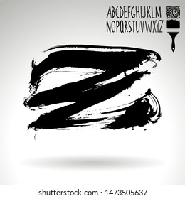 Black brush stroke and handwritten alphabet. Grunge vector abstract hand - painted element. Underline and border design.