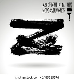 Black brush stroke and handwritten alphabet. Grunge vector abstract hand - painted element. Underline and border design.