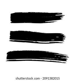 Black brush stroke. Set of hand drawn ink spots isolated on transparent background. Vector illustration