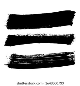 Black brush stroke and texture. Grunge vector abstract hand - painted element. Underline and border design.