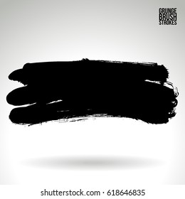 Black brush stroke and texture. Grunge vector abstract hand - painted element. Underline and border.