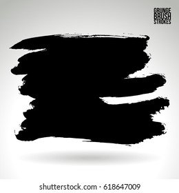 Black brush stroke and texture. Grunge vector abstract hand - painted element. Underline and border.
