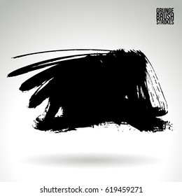 Black brush stroke and texture. Grunge vector abstract hand - painted element. Underline and border.