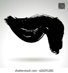 Black brush stroke and texture. Grunge vector abstract hand - painted element. Underline and border.