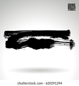 Black brush stroke and texture. Grunge vector abstract hand - painted element. Underline and border.