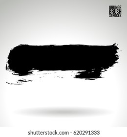 Black brush stroke and texture. Grunge vector abstract hand - painted element. Underline and border.