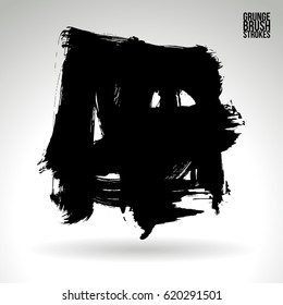 Black brush stroke and texture. Grunge vector abstract hand - painted element. Underline and border.