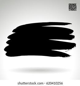 Black brush stroke and texture. Grunge vector abstract hand - painted element. Underline and border.