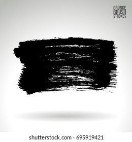 Black brush stroke and texture. Grunge vector abstract hand - painted element. Underline and border design.