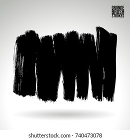 Black brush stroke and texture. Grunge vector abstract hand - painted element. Underline and border design.