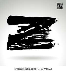 Black brush stroke and texture. Grunge vector abstract hand - painted element. Underline and border design.