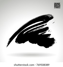 Black brush stroke and texture. Grunge vector abstract hand - painted element. Underline and border design.