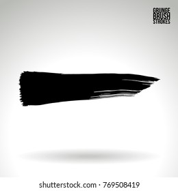 Black brush stroke and texture. Grunge vector abstract hand - painted element. Underline and border design.