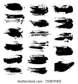 Black brush strokes isolated on a white background