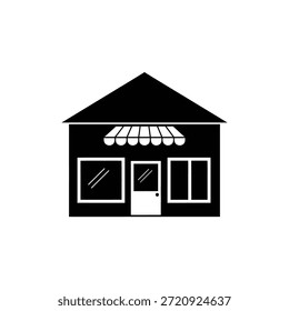 Black building facade with white windows and awning