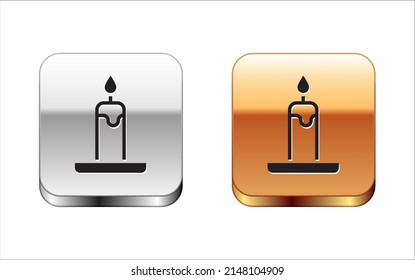 Black Burning candle in candlestick icon isolated on white background. Cylindrical candle stick with burning flame. Silver-gold square button. Vector