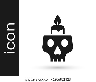Black Burning candle on a skull icon isolated on white background. Day of dead.  Vector