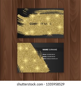 Black Business Card With Glittering Texture Of Gold Color, Visit Card On A Wooden Substrate, Vector EPS 10 Illustration