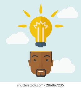 A black businessman has a bright idea for marketing strategy with a bulb on his head. Human intelligence concept. A Contemporary style with pastel palette, soft blue tinted background with desaturated