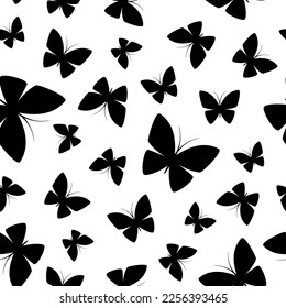 Black butterflies on white background. Vector seamless pattern. Best for textile, print, wallpapers, and home decoration.