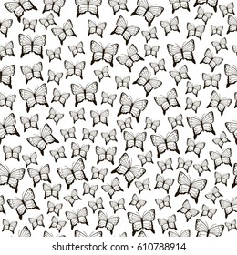 Black butterflies seamless pattern on the white background. Vector illustration.