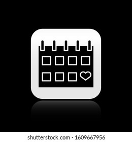 Black Calendar with heart icon isolated on black background. Valentines day. Love symbol. February 14. Silver square button. Vector Illustration