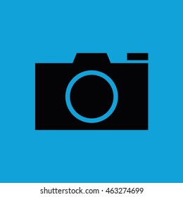 Black camera icon vector. Blue background
