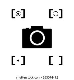 black camera with metering mode icon, vector illustration