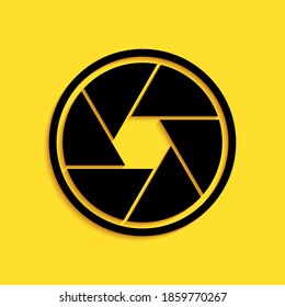 Black Camera shutter icon isolated on yellow background. Long shadow style. Vector.
