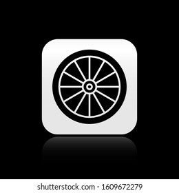 Black Car wheel icon isolated on black background. Silver square button. Vector Illustration