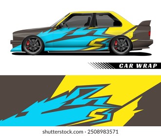 Black car with yellow, blue, and black abstract design for car wrap, suitable for automotive advertising and custom vehicle decor.