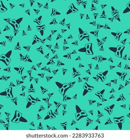 Black Carnival mask icon isolated seamless pattern on green background. Masquerade party mask.  Vector
