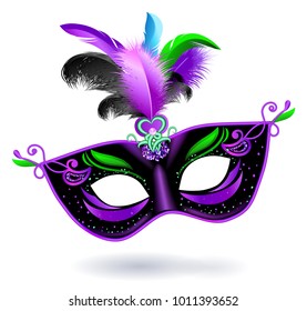 Black carnival mask with  violet pink  blue green feathers on white background