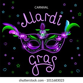 Black carnival mask with violet pink blue feathers on black background. Neon banner. Vector card with handwritten calligraphy text. Mardi gras 