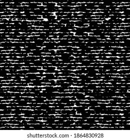 Black carpet with coarse white stitching. Irregular textile pattern consisting of broken linear strokes.