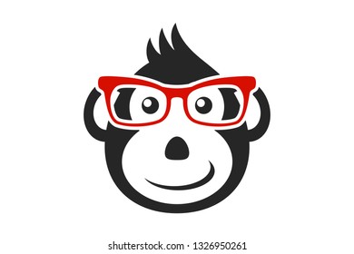 Black cartoon monkey face with red glasses isolated. Business monkey silhouette