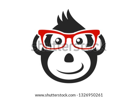 Black cartoon monkey face with red glasses isolated. Business monkey silhouette