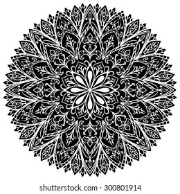 Black carved mandala isolated on white background. The pattern for tattoo. Vector circular ornament, element of decor.
