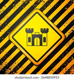 Black Castle icon isolated on yellow background. Warning sign. Vector