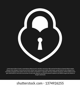 Black Castle in the shape of a heart icon isolated on black background. Locked Heart. Love symbol and keyhole sign. Vector Illustration