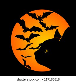 Black cat with bats in front of an orange moon