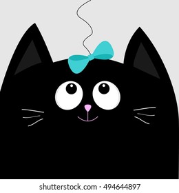 Black cat head looking at blue bow hanging on thread. Cute cartoon character. Pet baby collection Card. Flat design. Vector illustration.