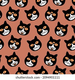 Black cat head with scary yellow eyes hand drawn vector illustration. Spooky feline character. Halloween seamless pattern.