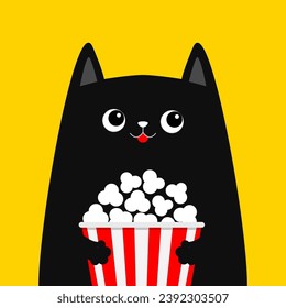 Black cat holding popcorn box. Cute cartoon funny character. Kitten watching movie. Cinema theater. Pop corn. Film show. Kids sticker print for tshirt. Flat design. Yellow background. Isolated. Vector