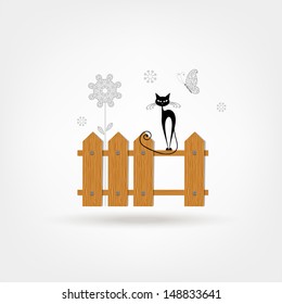 Black cat on wooden fence for your design