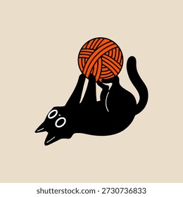 Gato negro jugando con hilo de tejer en el suelo